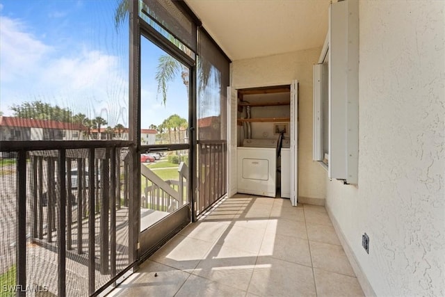 4345 27th Ct SW Unit 204, Naples, FL 34116 - unfurnished sunroom with washer / clothes dryer