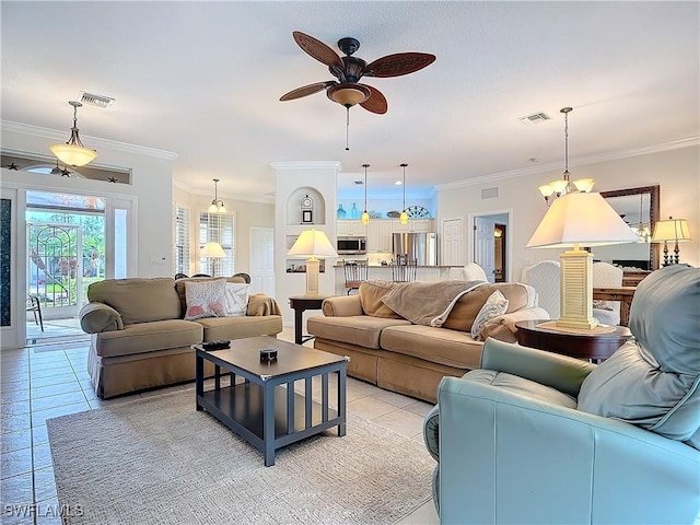 living room featuring visible vents, crown molding, and light tile patterned floors