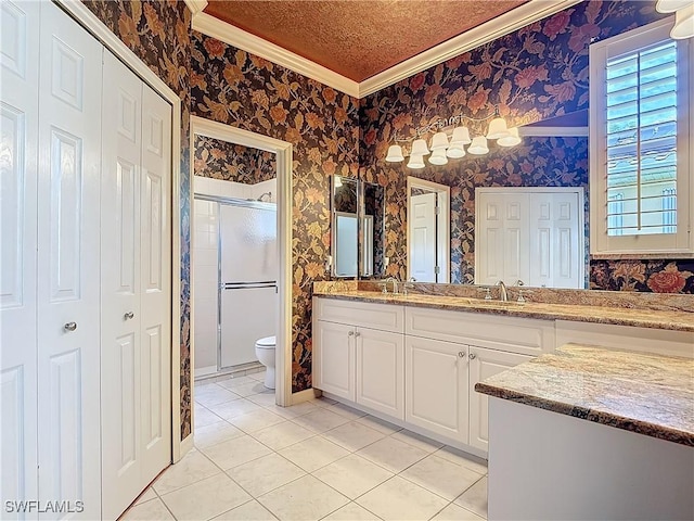 full bath featuring ornamental molding, a closet, and wallpapered walls