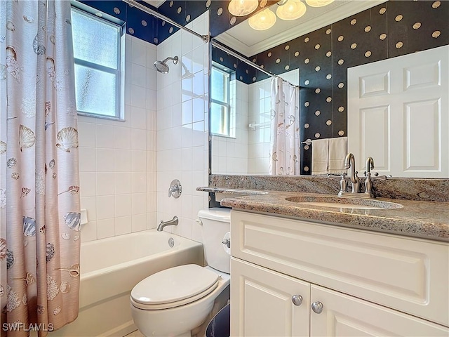 bathroom with shower / bath combination with curtain, a wealth of natural light, ornamental molding, and wallpapered walls