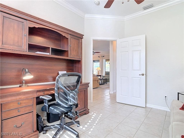 office space featuring ornamental molding, visible vents, ceiling fan, and light tile patterned floors