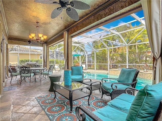 sunroom with ceiling fan