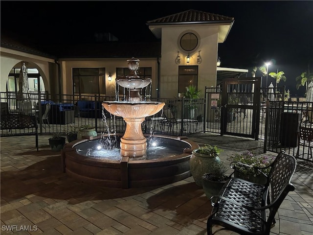 patio at night with fence