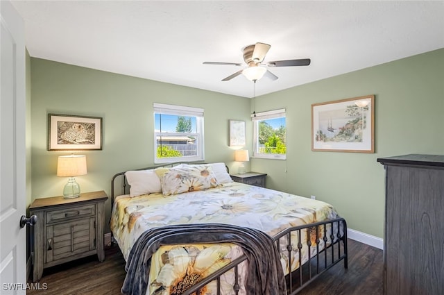 bedroom featuring dark wood-type flooring and ceiling fan