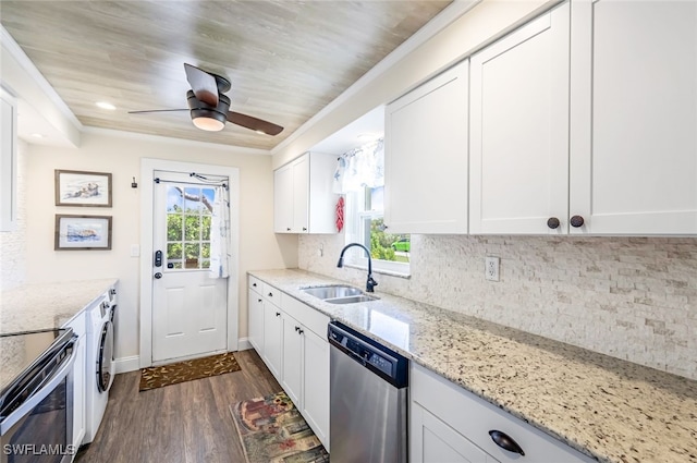 kitchen with white cabinetry, appliances with stainless steel finishes, sink, and light stone counters