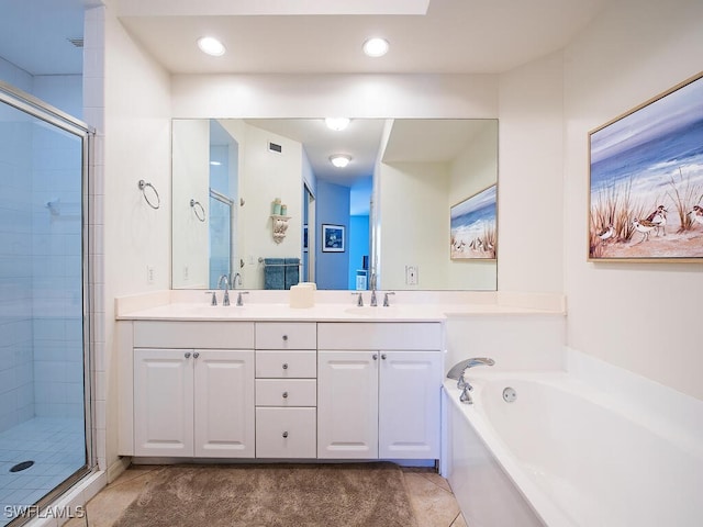 bathroom with vanity, tile patterned floors, and separate shower and tub