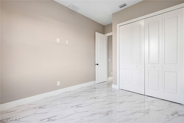 unfurnished bedroom featuring a closet