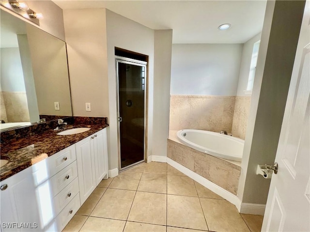 bathroom with vanity, separate shower and tub, and tile patterned flooring