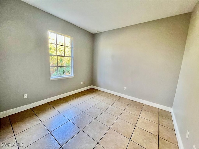 view of tiled spare room