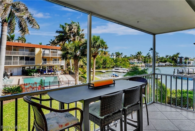 balcony featuring a water view