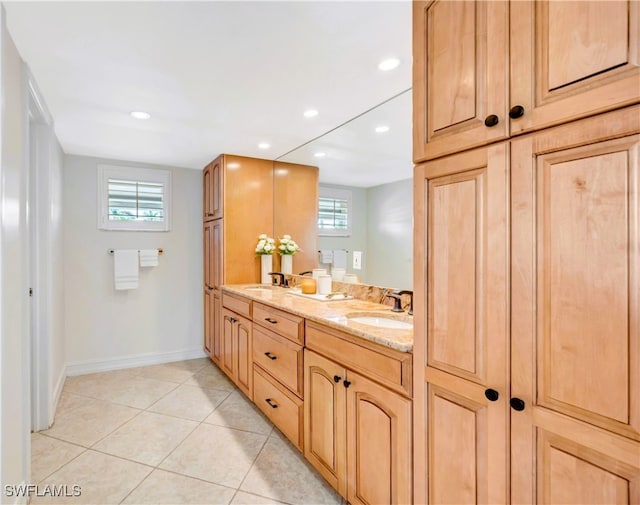 bathroom featuring vanity and tile patterned flooring