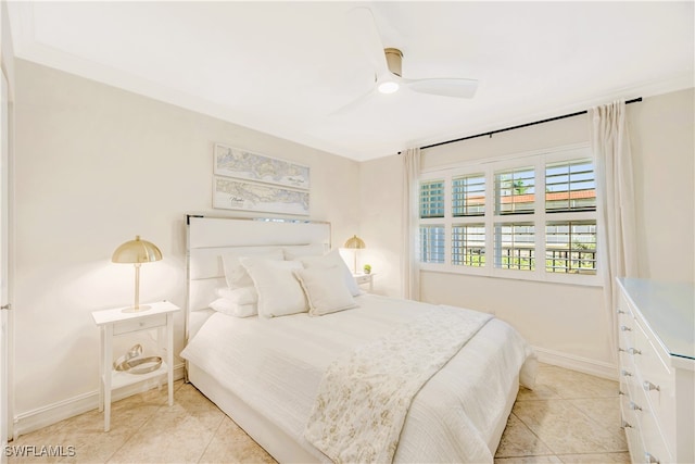 bedroom featuring ornamental molding, ceiling fan, and light tile patterned flooring