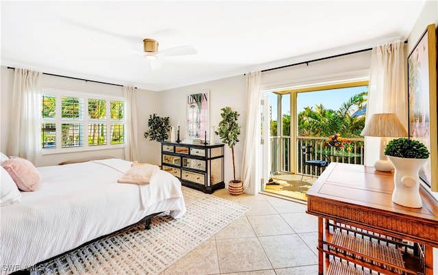 tiled bedroom with crown molding, ceiling fan, access to exterior, and multiple windows