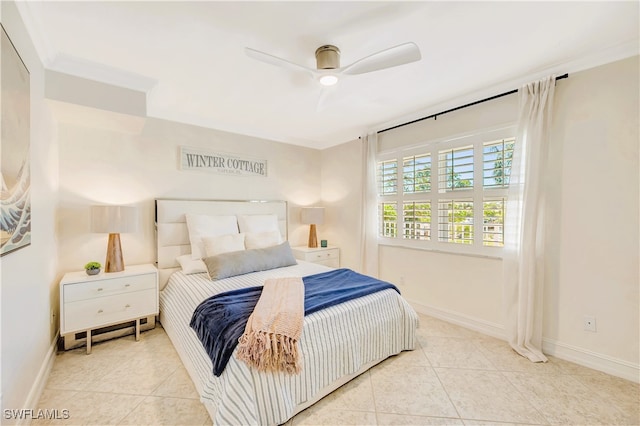 tiled bedroom featuring ceiling fan and ornamental molding