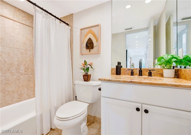 full bathroom featuring tile patterned flooring, vanity, shower / bathtub combination with curtain, and toilet