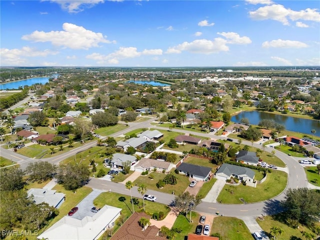 drone / aerial view featuring a water view