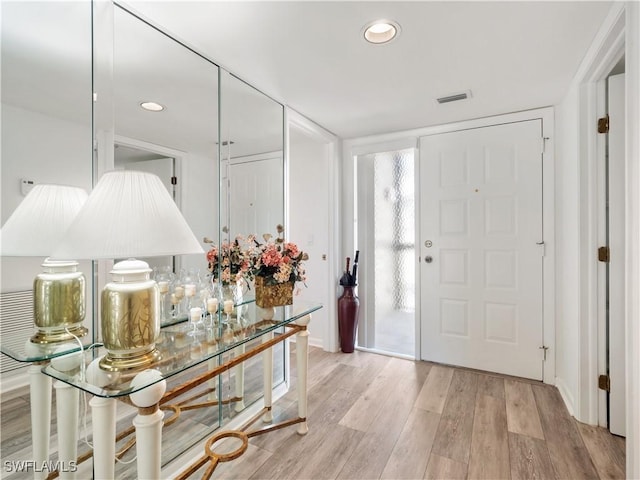 foyer featuring light wood-type flooring