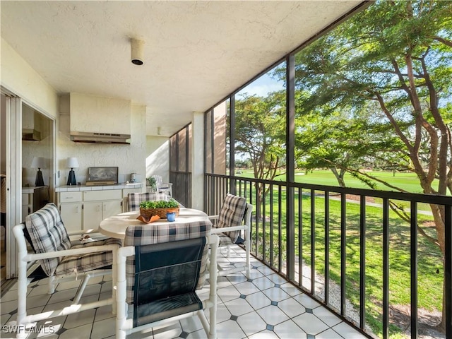 balcony with exterior kitchen