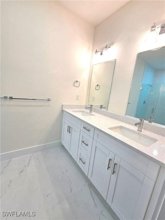 bathroom featuring vanity and walk in shower