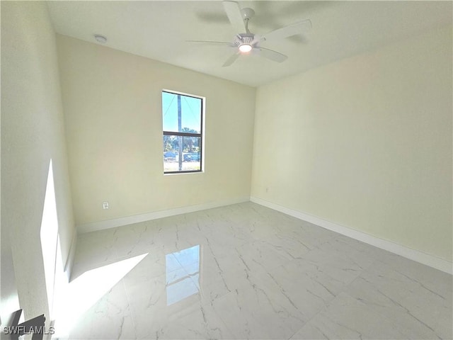 empty room featuring ceiling fan