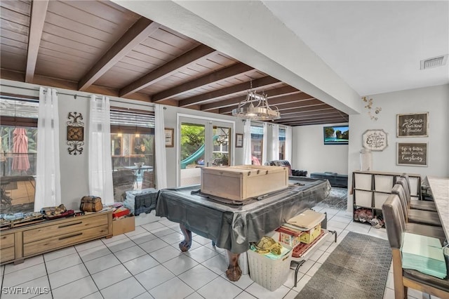 game room featuring wood ceiling, beamed ceiling, and light tile patterned floors