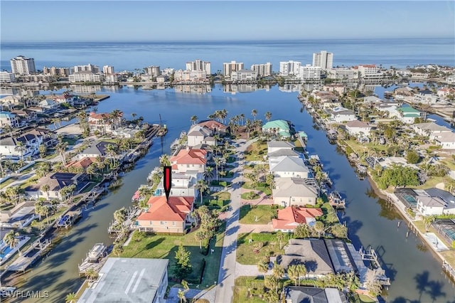 drone / aerial view with a water view