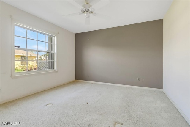 unfurnished room featuring ceiling fan