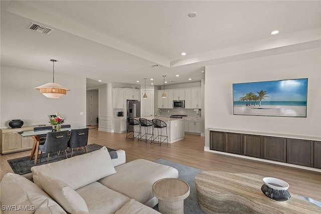 living room featuring light hardwood / wood-style floors