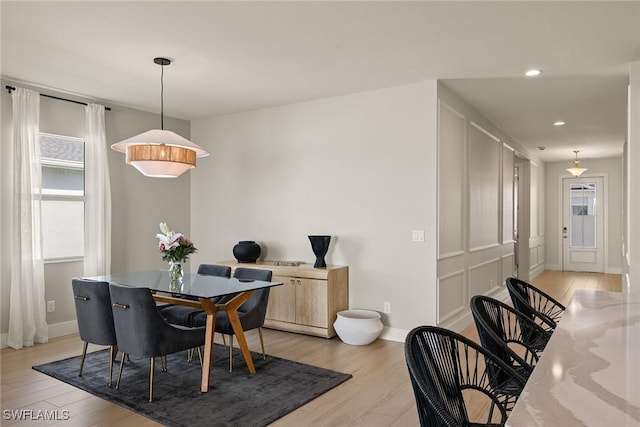 dining room featuring light hardwood / wood-style flooring