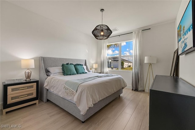 bedroom featuring light hardwood / wood-style flooring