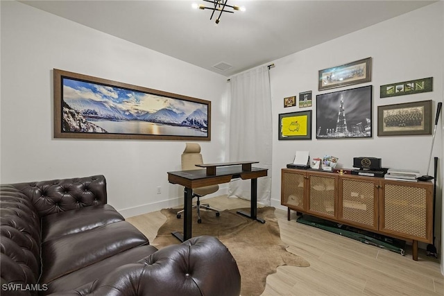 office area featuring light hardwood / wood-style floors