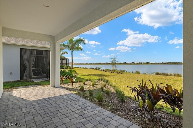 view of patio / terrace featuring a water view