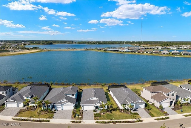 drone / aerial view with a water view