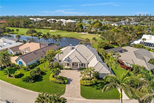 bird's eye view featuring a water view and a residential view