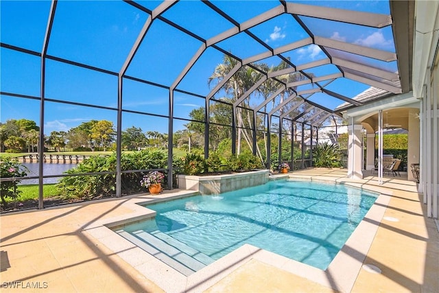 pool with glass enclosure and a patio