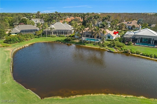 aerial view with a water view and a residential view