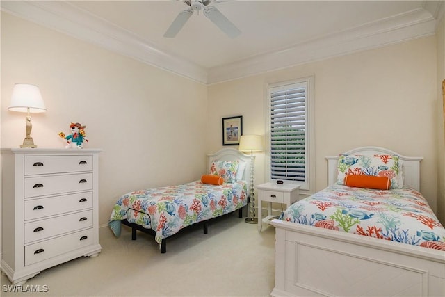 bedroom featuring light colored carpet, crown molding, and ceiling fan