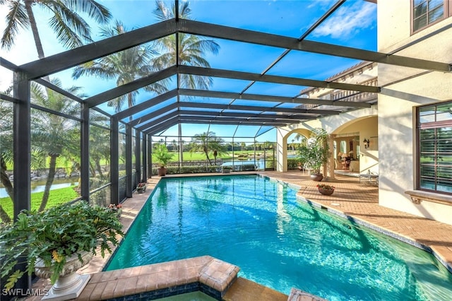 view of pool featuring a lanai and a patio area