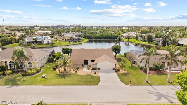 drone / aerial view with a water view