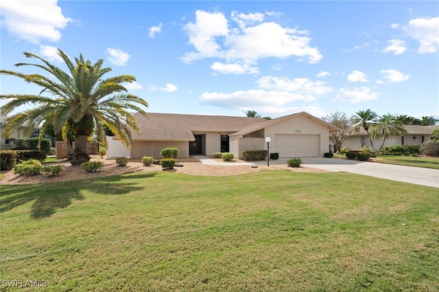 single story home featuring a front yard and a garage