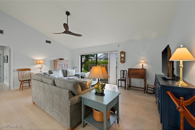 living room with light wood-type flooring, high vaulted ceiling, and ceiling fan