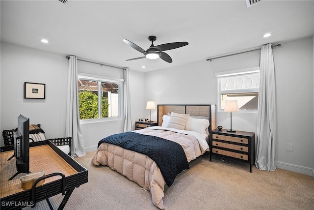 carpeted bedroom featuring baseboards, a ceiling fan, and recessed lighting