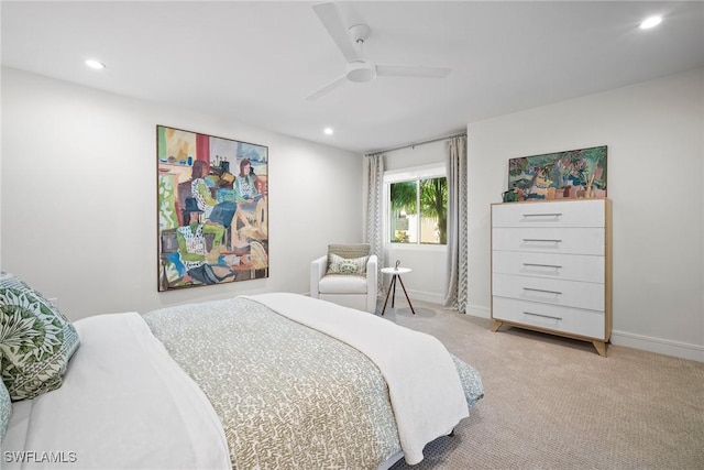 bedroom with light carpet, ceiling fan, baseboards, and recessed lighting