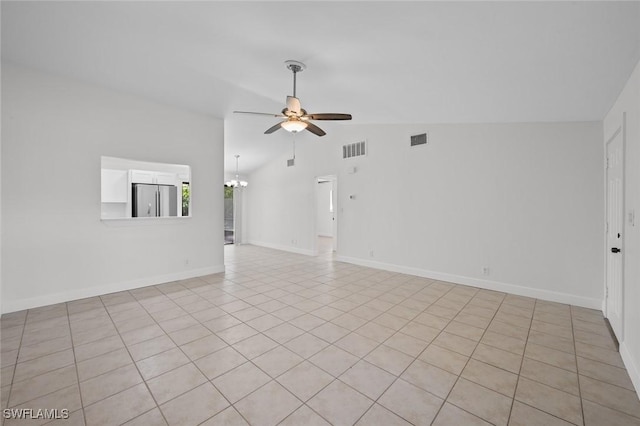 spare room with lofted ceiling and ceiling fan with notable chandelier