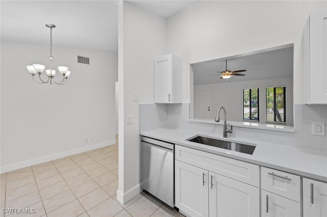 kitchen with sink, ceiling fan with notable chandelier, white cabinets, decorative backsplash, and stainless steel dishwasher