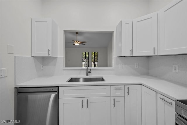 kitchen with white cabinetry, sink, and dishwasher