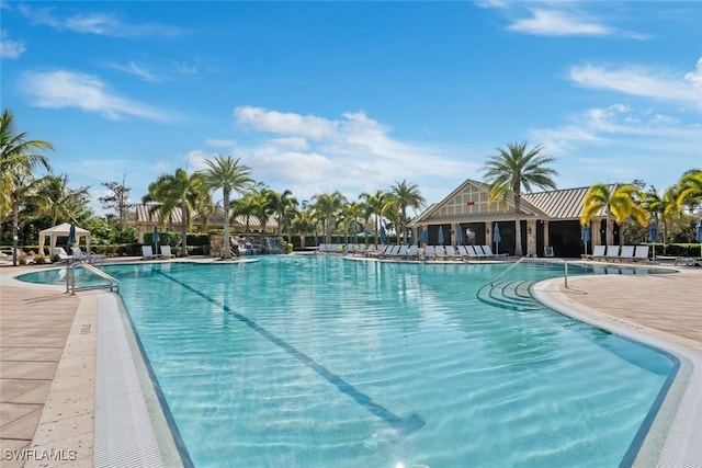 view of swimming pool featuring a patio area