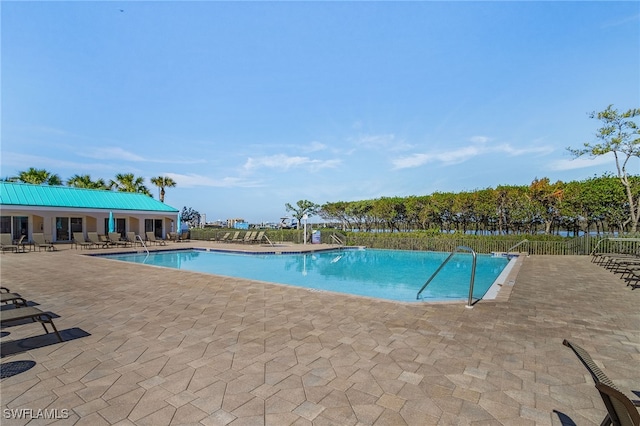 view of pool with a patio