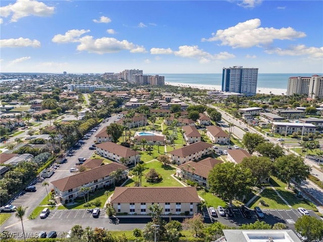 bird's eye view featuring a water view and a view of city