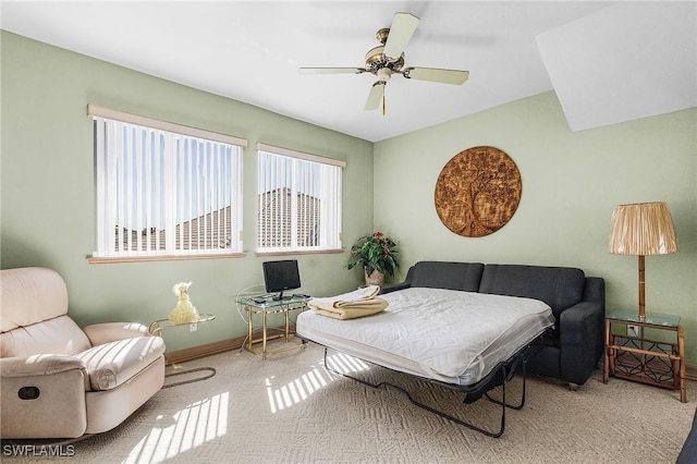 bedroom with carpet, ceiling fan, and baseboards